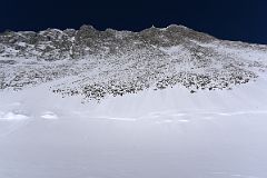 07E Branscomb Peak Towers Above As We Take Our Final Rest On The Climb From Mount Vinson Base Camp To Low Camp.jpg